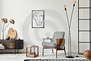 Stylish scandinavian composition of living room with design armchair, black mock up poster frame, commode, wooden stool, lamp.