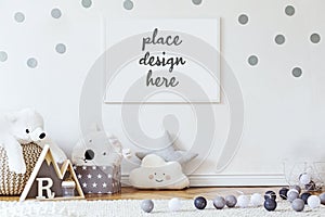 Stylish scandinavian kid room with mock up poster, toys, teddy bear, plush animal, natural pouf and children accessories. Modern.