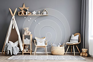 Stylish scandinavian newborn baby room with toys, children's chair, natural basket with teddy bear and small shelf