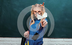 Stylish school pupil modern girl. Cute female funky style. Enjoying her school life. Fancy schoolgirl. School fashion