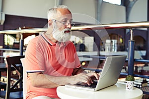 Stylish senior man with beard and moustache