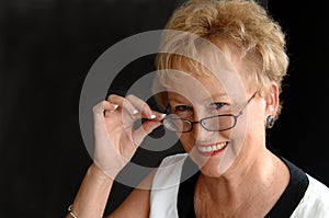 Stylish senior wearing glasses