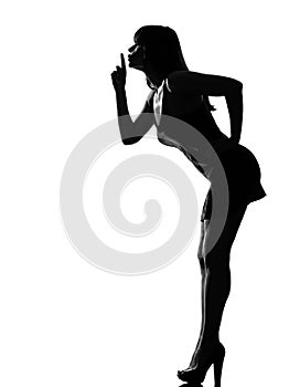 Stylish silhouette woman hushing silence