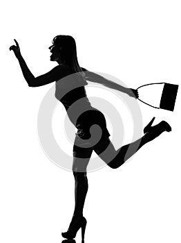 Stylish silhouette woman running hailing hurrying photo