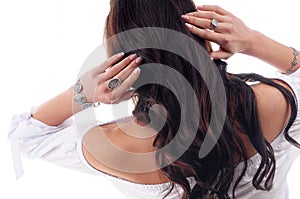 Stylish silver accessory on woman. Finger ring and bracelet. Close-up studio isolated shot of spring jewelry collection