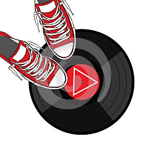 Stylish sneakers and a vinyl record. Vector illustration.