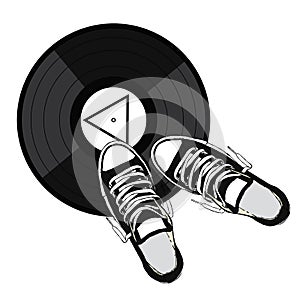 Stylish sneakers and a vinyl record. Vector illustration.