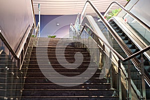 Stylish stairs and a escalator lift of a shopping mall unique photo