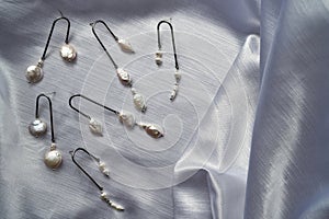 Stylish sterling silver dangle earrings with pearls
