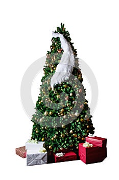 Stylish studio shot of a beautiful lush Christmas tree decorated