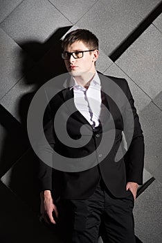 Stylish successful handsome young businessman