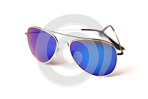 Stylish sunglasses with blue glasses isolated on a white background