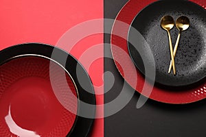Stylish table setting with plates and spoons on color background, top view