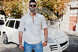 Stylish tall arabian man model in white shirt