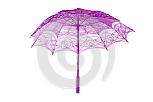 stylish umbrella used in wedding and arti with penbe lace on black background photo