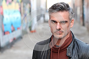 Stylish urban mature man portrait with copy space