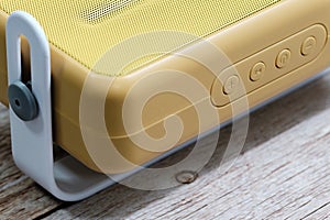 Stylish vintage radio macro view on wood table background