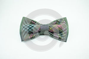 Stylish and well-designed green bow tie on a white background isolated