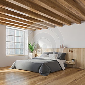 Stylish white and wooden bedroom corner