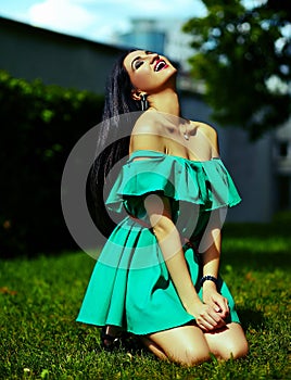 Stylish woman girl on casual green dress