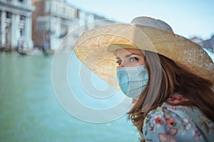 Stylish woman and having excursion on vaporetto water bus photo