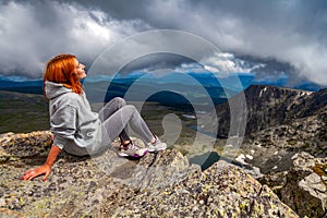 Stylish woman hiking