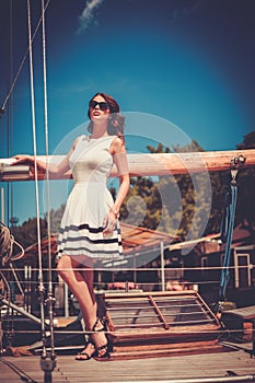 Stylish woman on a luxury regatta