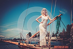 Stylish woman on a luxury regatta