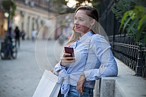 Stylish woman on a shopping tour in the city.