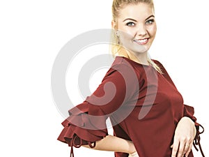 Stylish woman wearing burgundy top