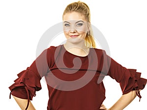 Stylish woman wearing burgundy top