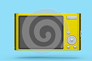 Stylish yellow compact pocket digital camera isolated on blue background