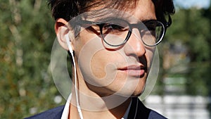 Stylish Young Business Man with Earphones