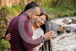 stylish young couple with retro camera