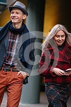 Stylish young couple walk smiling fashion casual