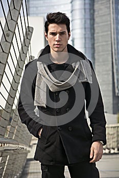 Stylish Young Handsome Man in Black Coat Standing in City Center Street