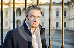 Stylish Young Man in front of Historical Building