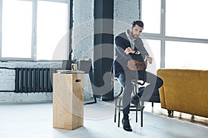 Stylish young man in a suit and bow tie. Business style. Fashionable image.