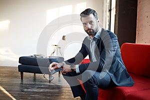 Stylish young man in a suit and bow tie. Business style. Fashionable image. Evening dress.