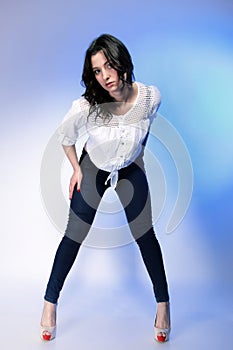 Stylish young plus size model in fashion jeans