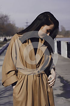 Stylish young woman out for a walk. she dressed and looks very fashionable