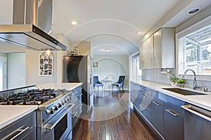 Stylishly updated kitchen with stainless steel appliances.