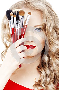 Stylist with make up brushes