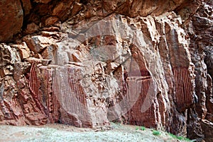 Stylized aboriginal paintings on the pock face