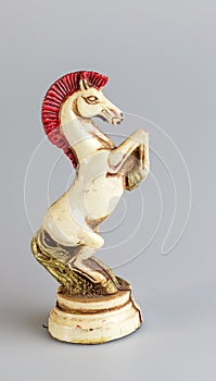 Stylized chess. Close-up of a chess horse on a white background