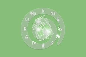 Stylized clockface with essential vitamins and microelements for human health, hand drawn human Heart, light green background.