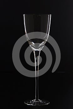 stylized crystal glass, very tall, photographed on a black background, highlighting the outline