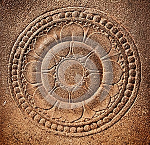 Stylized lotus carved on stone