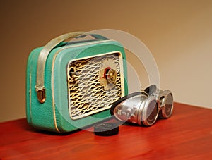 A stylized old radio and motorbike glasses