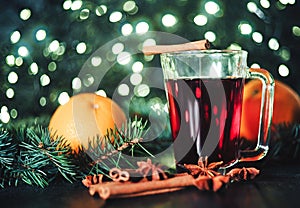 Stylized photo of mulled wine on a christmas background